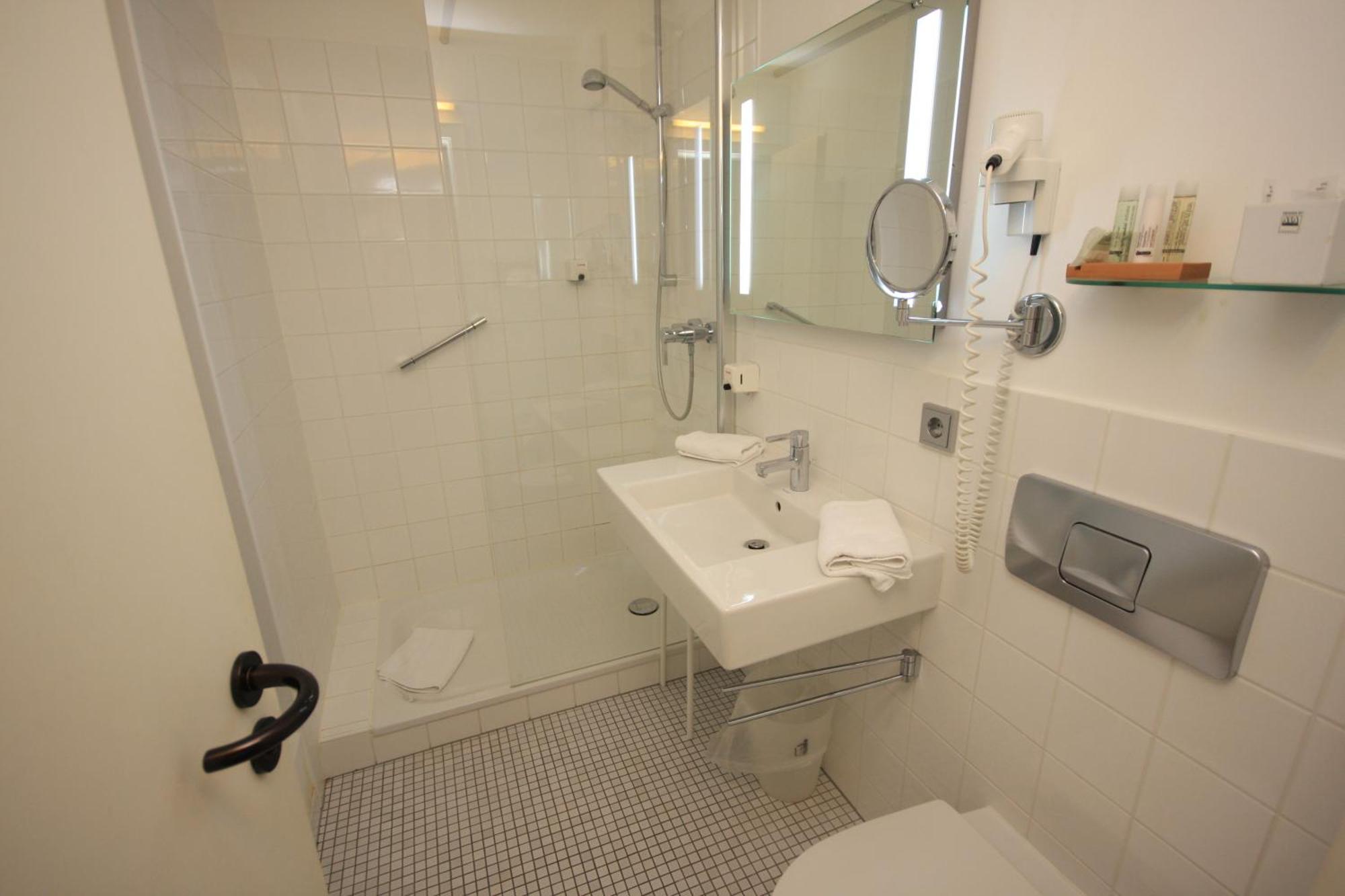Hotel Am Main Veitshochheim Ruang foto